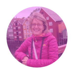 Image with a pink filter of a woman with light blue shirt.