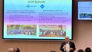 Speaker presenting a slide titled “ACM Schools” with key dates and locations, during a conference session.