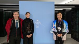 Two men and a woman standing