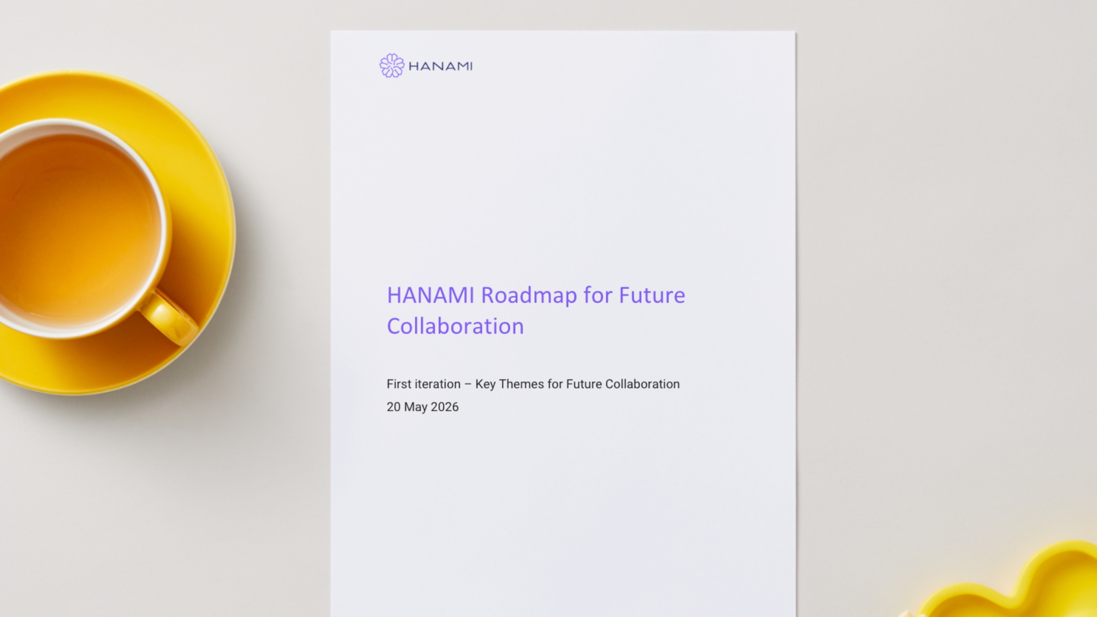 HANAMI's Roadmap for Future Collaboration document next to an orange mug.