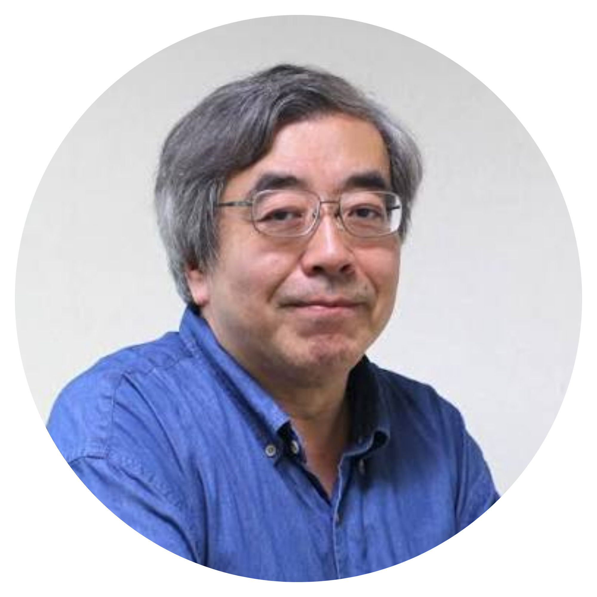 Man with glasses wearing a blue shirt.