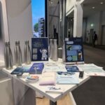 Close-up of a exhibition stand at ISC 2026, showcasing project brochures, branded merchandise, and information about the EU–Japan collaboration in HPC.