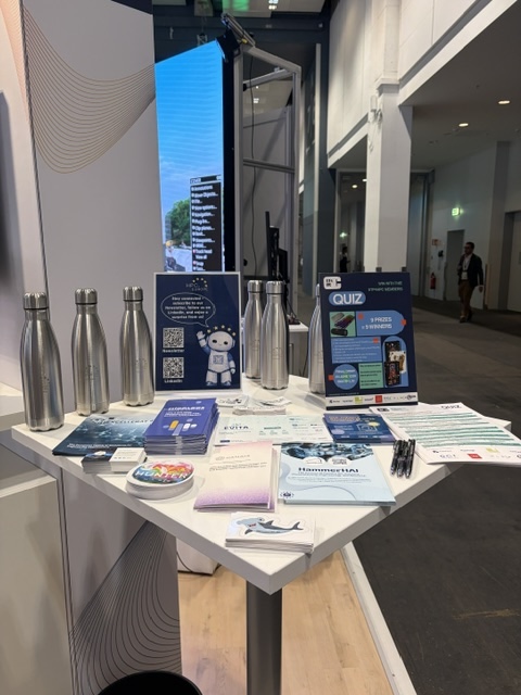 Close-up of a exhibition stand at ISC 2026, showcasing project brochures, branded merchandise, and information about the EU–Japan collaboration in HPC.